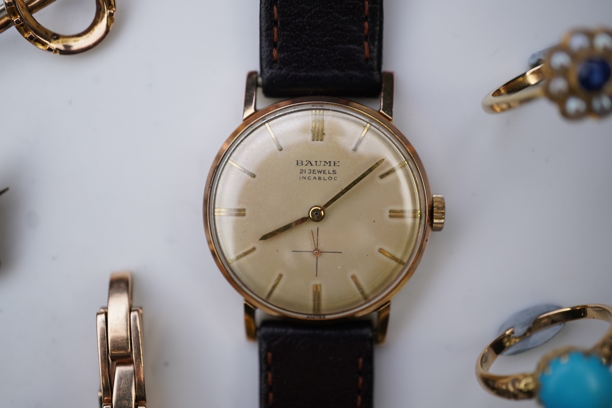 A group of jewellery and two watches